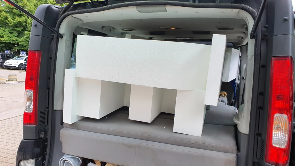 polystyrene foam letters loaded in car