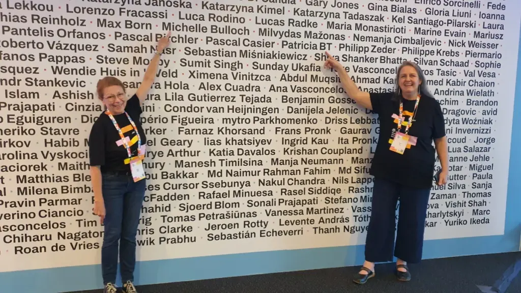 Michelle and Patricia on the organisers and volunteers wall