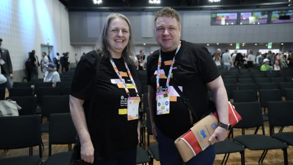 Passing the baton to the Polish team, here with Maciej (Matt) Pilarski, photo of 2 persons: Patricia and Maciej. Photo by Chiharu Nagatomi